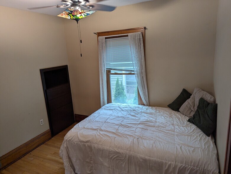 Primary Bedroom with built in dresser - 1727 Girard Ave N