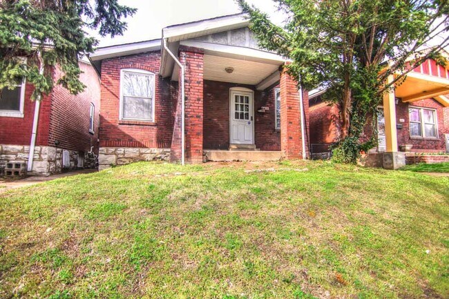 Building Photo - This 2 bedroom 1 bath home has been completely refinished with brilliant hardwood floors throughout!