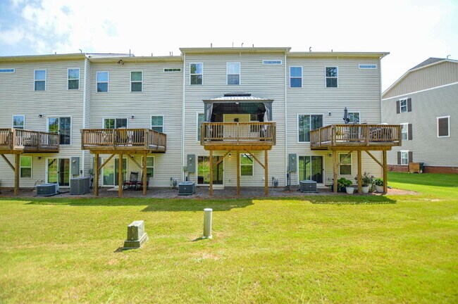 Building Photo - 3 Bedrooms | 2.5 Bathrooms | Lower-Level Flex Room | Approximately 1,978 Square Feet | 2-Car Gara...