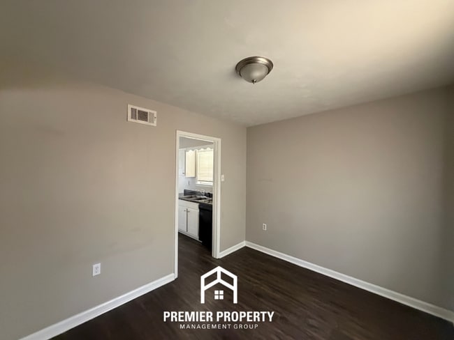 Building Photo - Spacious 4BR/2BA Home in Bartlett Cove | Brick Fireplace & Formal Dining