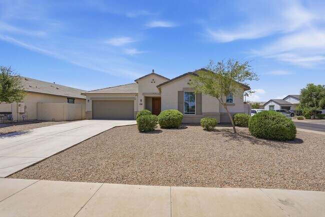 Building Photo - Spacious 5-Bedroom Home with Open Floor Plan & Private Backyard