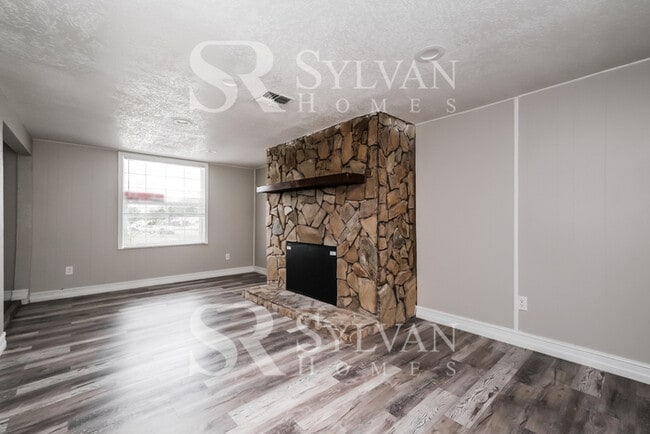 Building Photo - You Can Afford to Dwell Well.