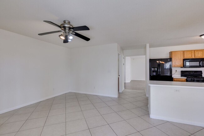 Building Photo - Spacious 4 Bedroom 2.5 Bathroom Home with Covered Patio & Large Backyard