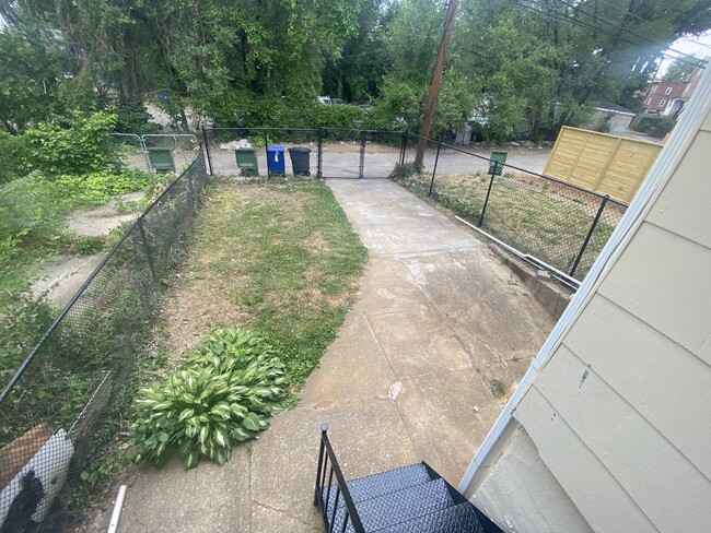 spacious fenced in back yard - 606 N Woodington Rd