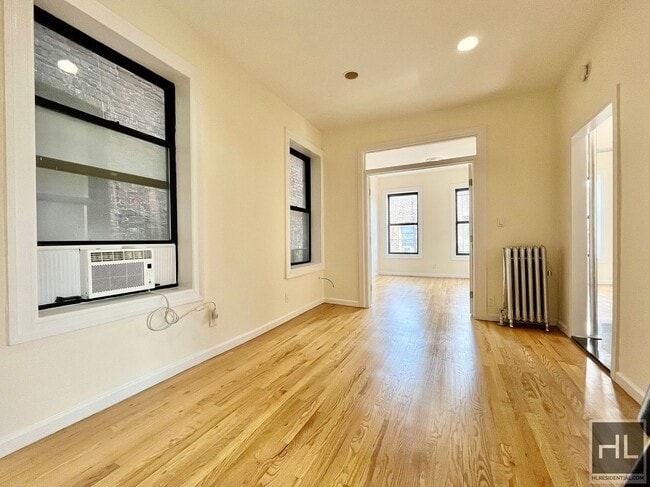 Building Photo - 229-231-231 E 12th St