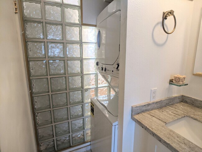 Building Photo - Sweeping Views from this partially furnished 1 Bed 1 Bath Condo w/ 1 Covered Parking