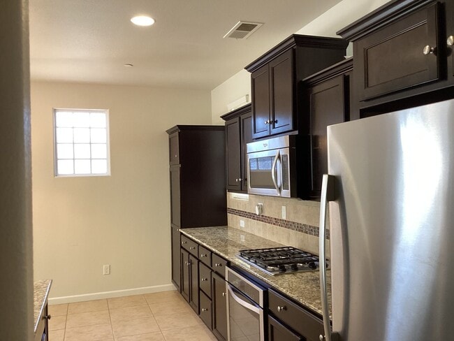 Building Photo - 7009 Harmony Dr