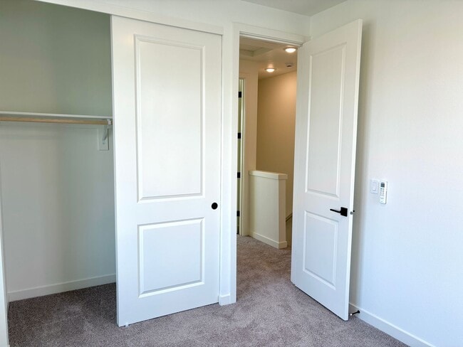 Building Photo - St. Johns New Build - Bright and Spacious End Unit 2 Bedroom with A/C, Washer/Dryer and Private P...