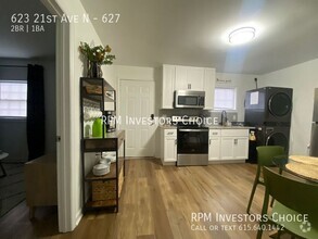 Building Photo - Furnished 2/1 Apartment Mid-town Location