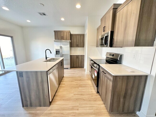 Building Photo - REDUCED PRICE!! Beautiful FOUR Bedroom Home!
