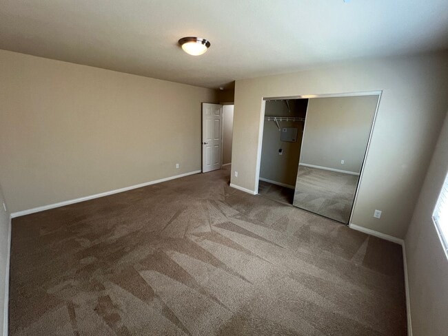Building Photo - A Fantastic 4 Bedroom Home with the primary Downstairs, in Silverado Ranch