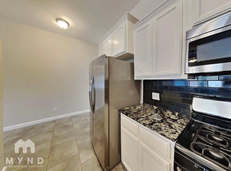 Building Photo - 1001 Merlin Dr