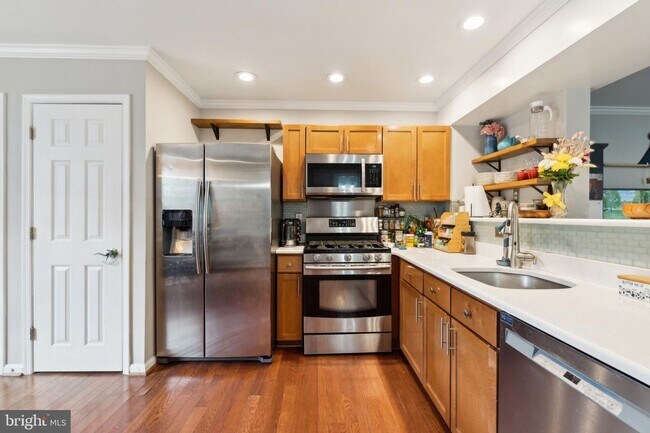 Building Photo - Welcome to this beautifully updated three ...