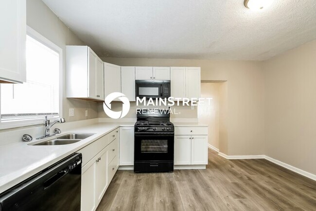 Building Photo - 3050 S Roena St