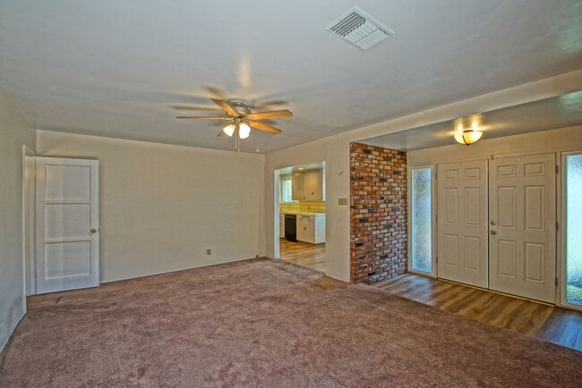 Building Photo - SPACIOUS, BRIGHT & AIRY, 3BR2BA HOME W/ GREAT OUTDOOR SPACE, LARGE DRIVEWAY W/ COVERED CARPORT & ...