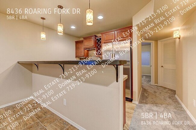 Building Photo - 8436 Roaring Fork Dr