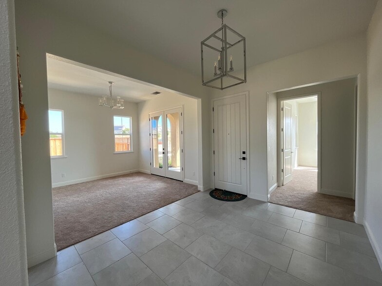 Entrance and Hallway and Lower Bed Room1 - 499 Russell Way