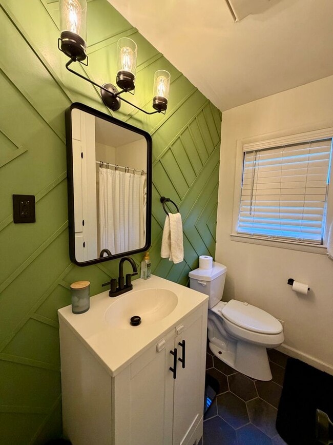 Building Photo - {7710} Prairie Village Split Level with Two Car Garage + Two Full Bathrooms + Hardwood Floors + U...