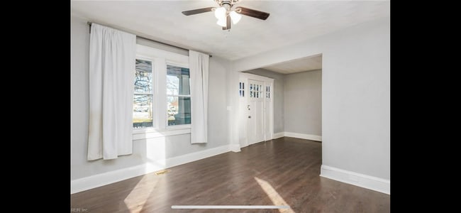 Living room looking at front entry - 3436 Chesapeake Blvd