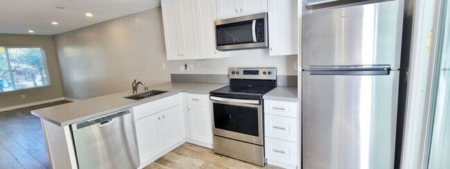 Building Photo - Charming 2BR Retreat with Private Patio, Scenic Views & Resort-Style Amenities