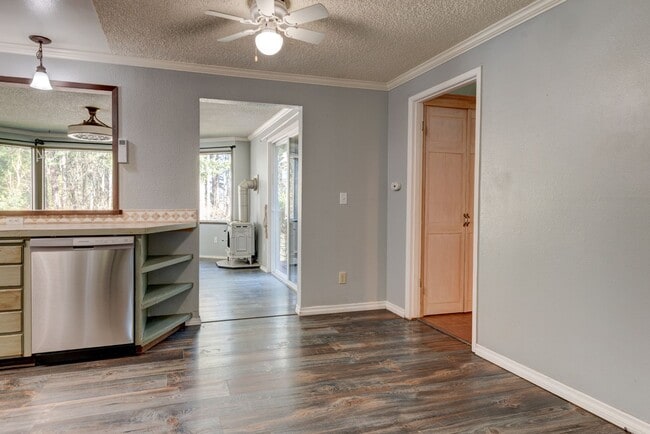 Building Photo - Spacious 4-Bedroom Home with Fireplace, Fenced Yard, and 2-Car Garage