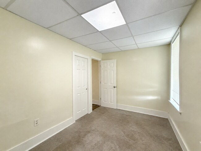 Building Photo - Charming Baltimore Rowhome with Updated Kitchen, Covered Front Porch & Basement