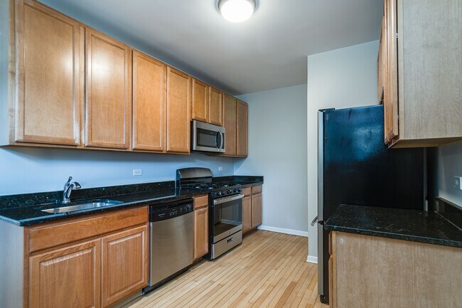 Kitchen with new SS Appliances - 603 Washington Blvd