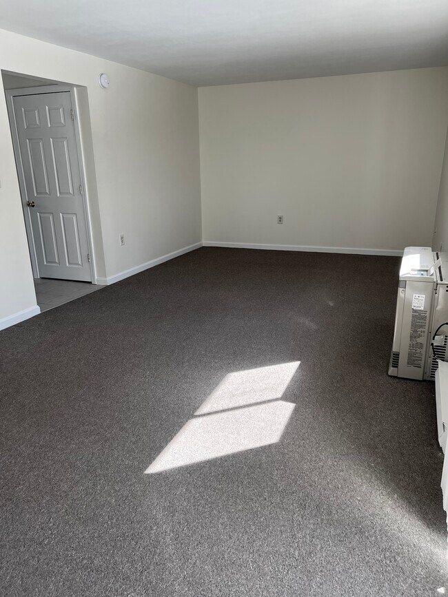 Another angle- Living Room w/Propane heat- Rinnai - 801 US Route 1