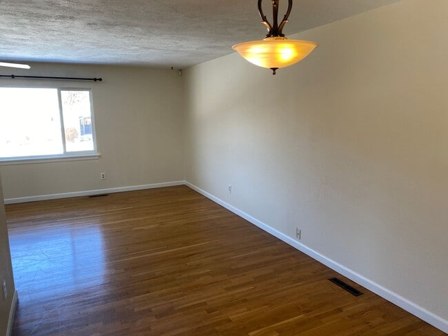 Building Photo - Great corner lot home backing up to open s...