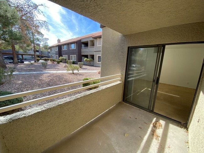 Building Photo - Charming 1 Bed/1Bath  2-Story Condo nestled in this Beautifully Gated Community in Spring Valley!