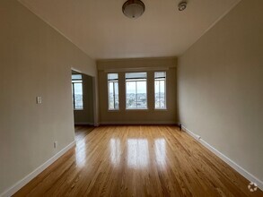 Building Photo - Bright & Spacious Studio with Stunning Cit...