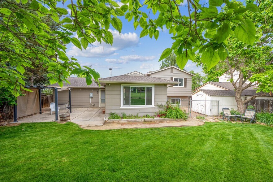 Beautiful Backyard with Flower Gardens - 9385 Carr St