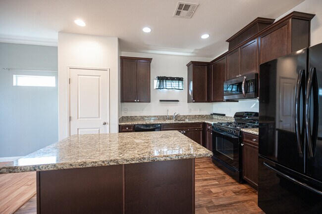 Building Photo - 8904 Harmony Hall Ave