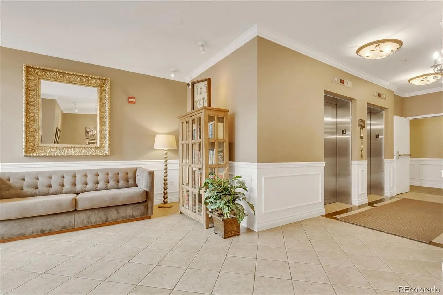 Building entry with elevators - 2700 E Cherry Creek South Dr