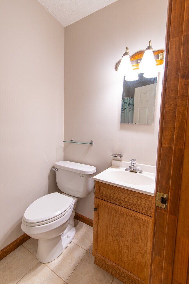 Second Bathroom Vanity & Toilet - 4747 Knollwood Dr NW