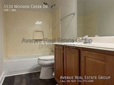 Building Photo - 5530 Wooded Creek Dr