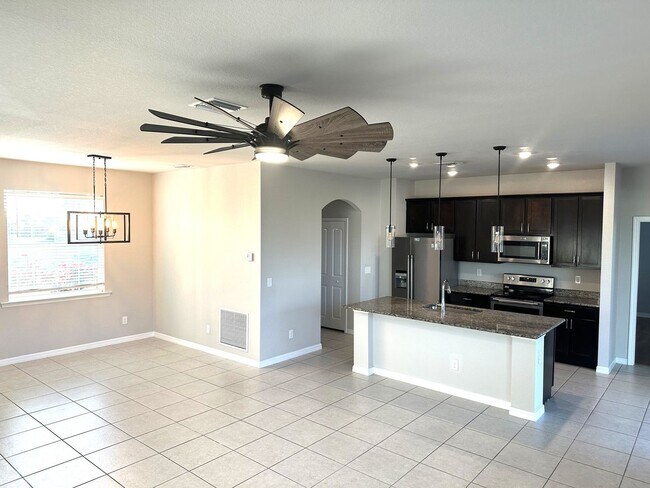 Building Photo - Available Mid April!! NW CAPE CORAL 3 BEDROOM 2 BATHROOM 2 CAR GARGAGE