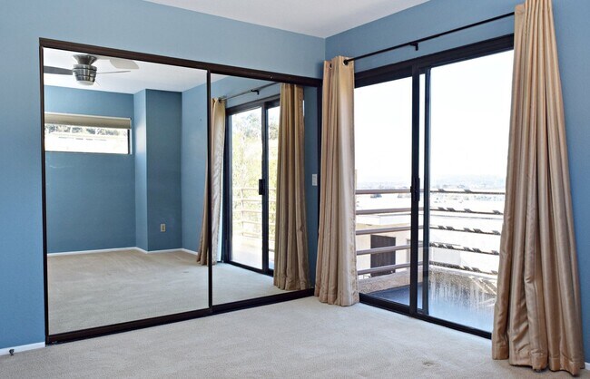 Building Photo - Modern 2 Bed 2.5Bath Townhome with Garage, Balconies & In-Unit Laundry in Linda Vista