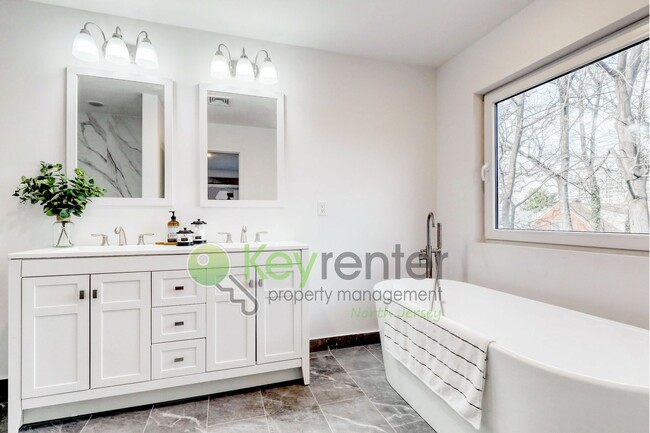 Building Photo - Modern New Construction 3 Bedroom Townhome with Garage & Driveway — First Occupancy!