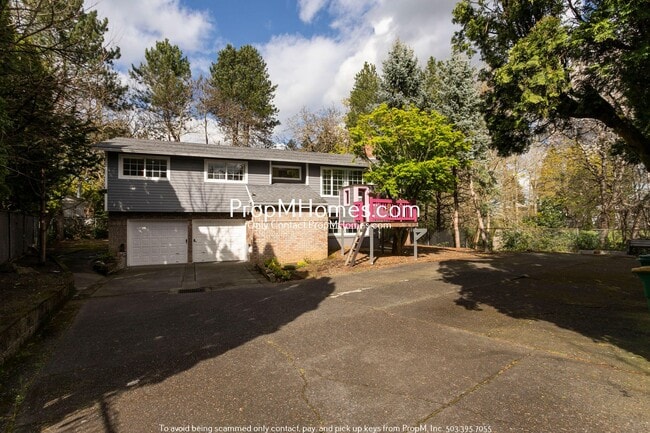 Building Photo - Secluded Nature Retreat: 4 Bedrooms!