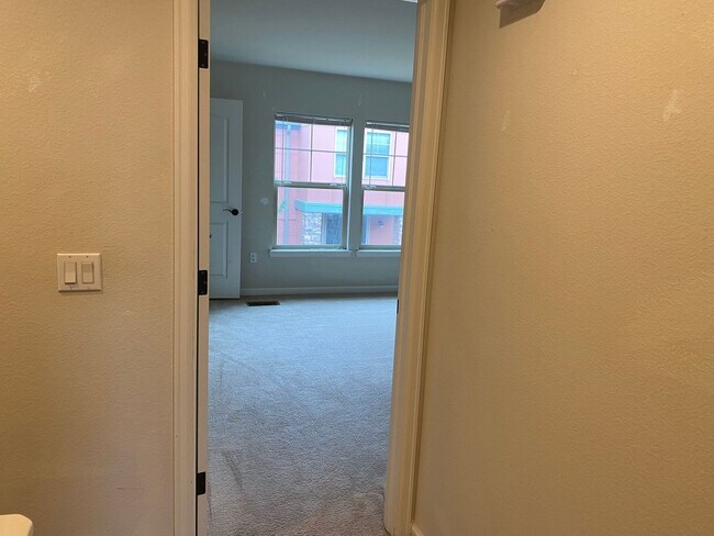 Building Photo - Large garage with attached spacious 2 bedroom townhome