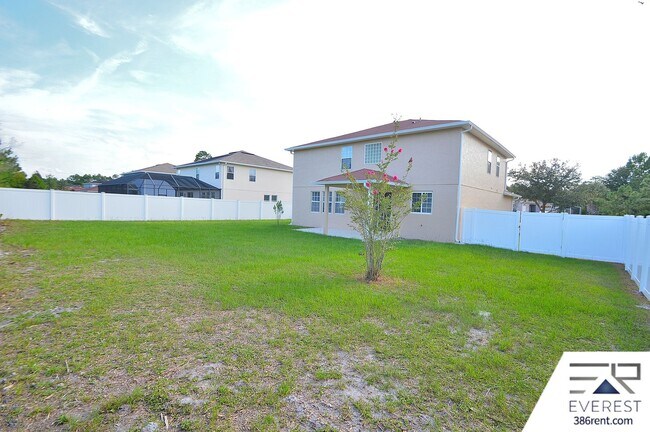 Building Photo - SPACIOUS, FULLY FENCED 4/2.5/2 IN DESIRABLE MATANZAS WOODS