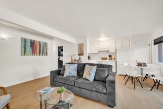 Building Photo - Darling Fully Furnished Condo Bathed in Natural Light
