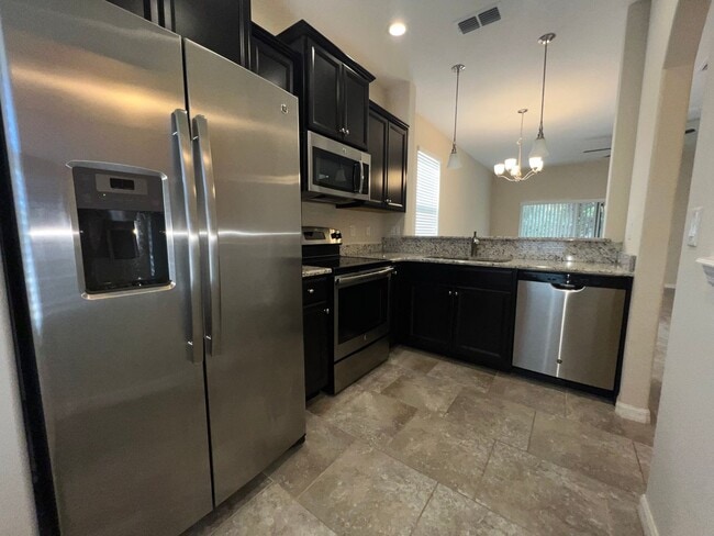 Building Photo - BEAUTIFUL Grande Champion at LPGA Townhome, Lake & Preserve Views, 3 Bedrooms, 2.5 Bathrooms AVAI...