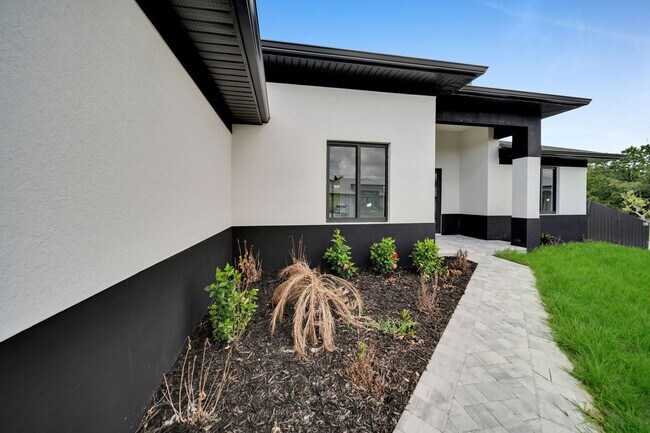 Building Photo - Brand-New Pool Home for Rent – Port Charlo...
