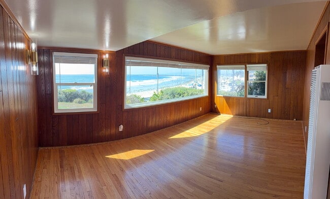 Building Photo - Sunsets Over the Pacific from Your Cottage Living Room, While the Waves Roll in Below. Every Even...