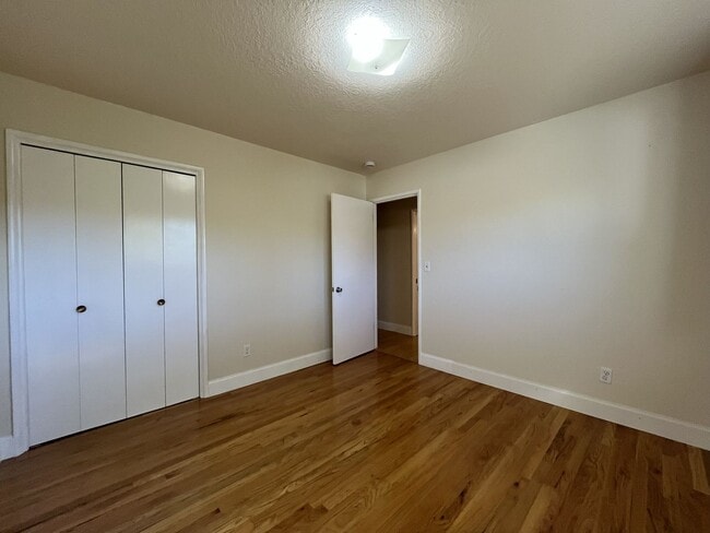 Building Photo - Light-Filled Home with Open Layout, Modern...