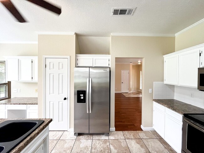 Building Photo - Available NOW!!!! This beautiful 2 story, 4 bedroom, 2 bath, two car garage with garage door open...