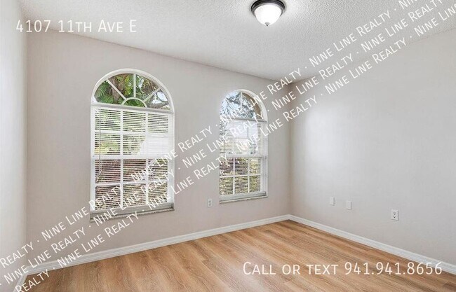 Building Photo - 4107 11th Ave E