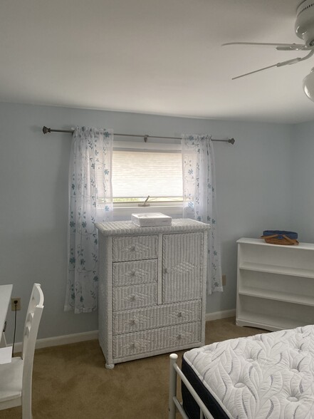 furnished bedroom with desk - 741 Ferdinand St